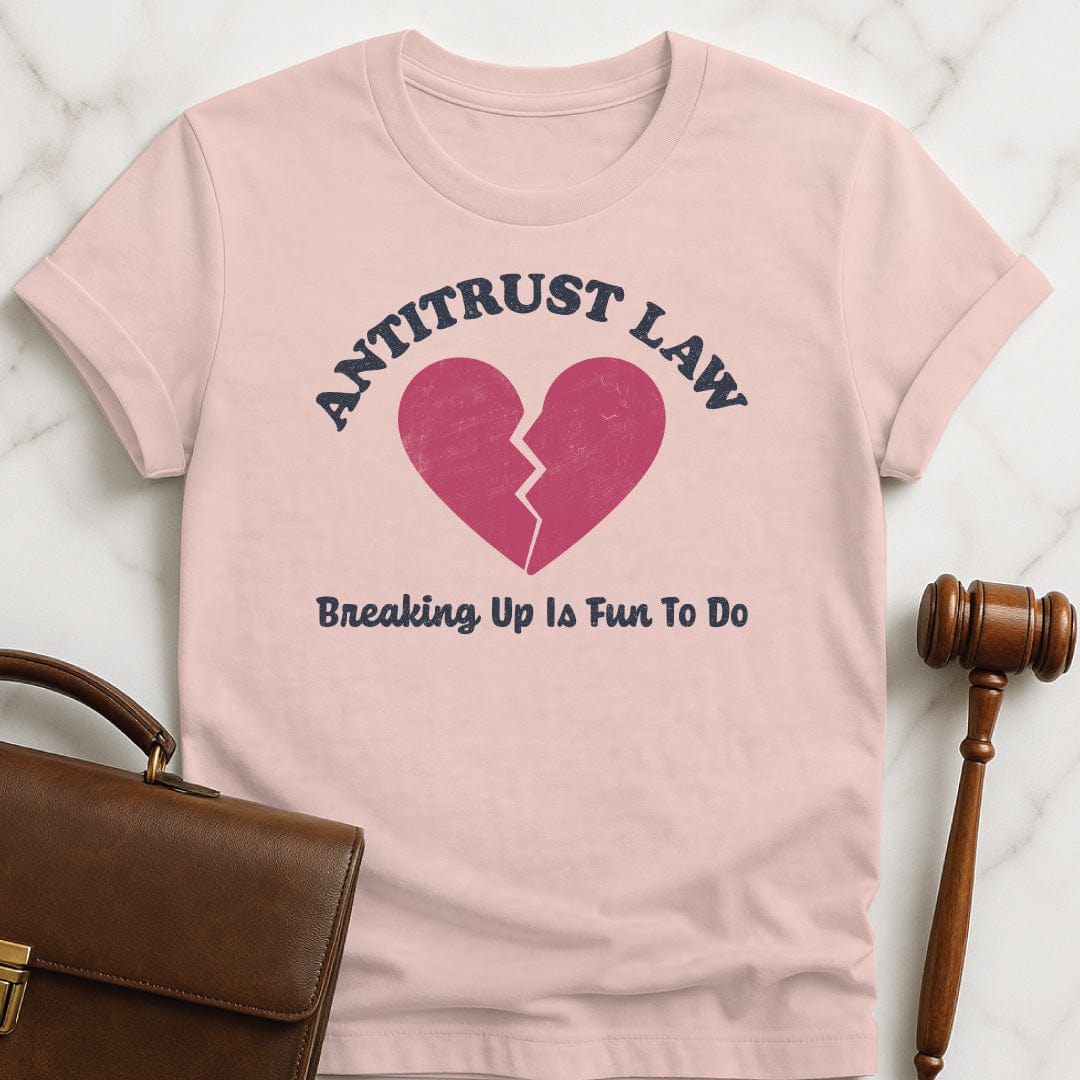 unique lawyer graphic tee that says Antitust law breaking up is fun to do featuring broken heart in pink