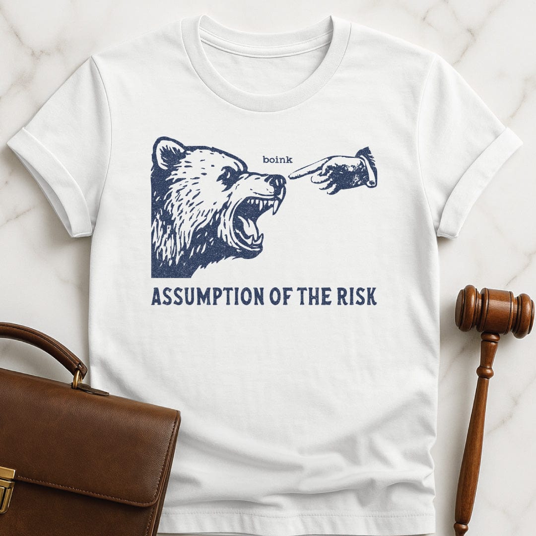 cool law school t shirt that says Assumption of the risk featuring a hand about to tap a growling bear on the nose and the text boink in white