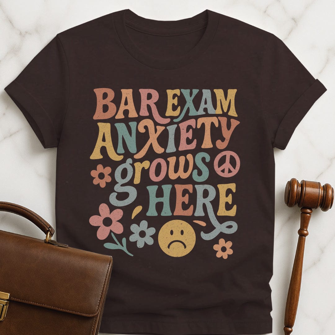 cute new attorney t-shirt that says bar exam anxiety grows here featuring flowers and peace signs in brown