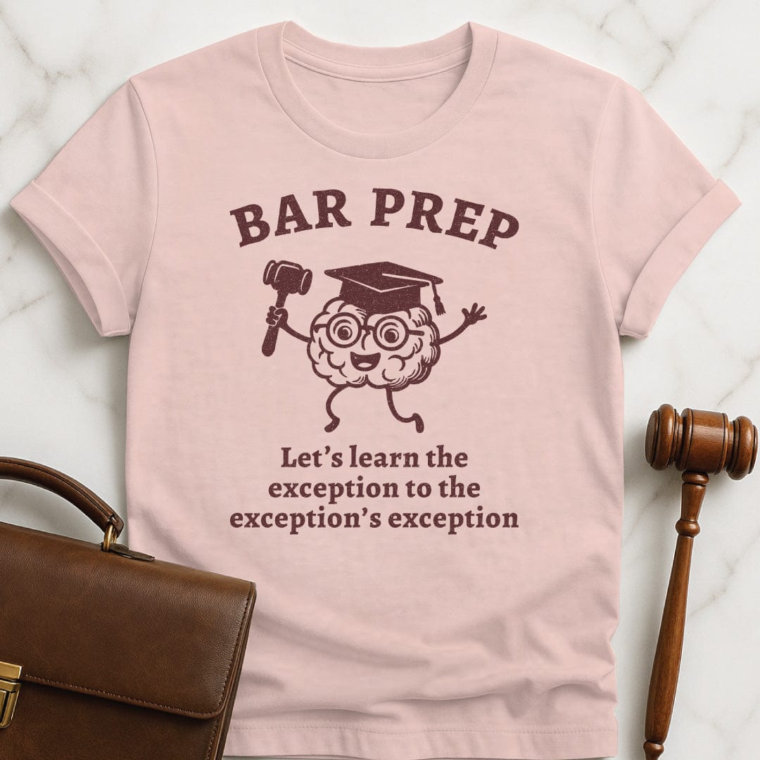 ironic lawyer graphic t shirt that says Bar Exam Lets Learn the Exception to the Exceptions Exception featuring brain with a graduation hat and a gavel in pink