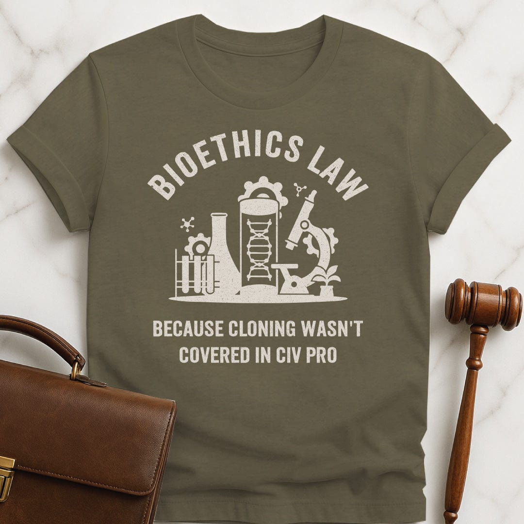nerdy law school t shirt that says Bioethics law because cloning wasnt covered in civ pro featuring a science lab in heather green