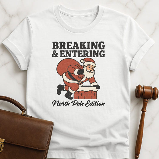santa new lawyer t shirt that says Breaking and entering North Pole edition featuring Santa Claus going down a chimney in white