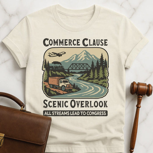 cool law school tee that says Commerce Clause Scenic Overlook All streams lead to congress featuring wilderness with a plane truck and train in cream