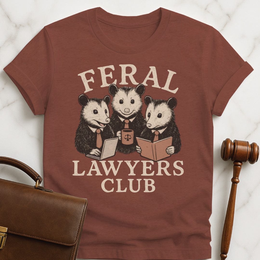 funny new lawyer graphic t shirt that says feral lawyers club featuring three possums in business suits and a briefcase in heather brown
