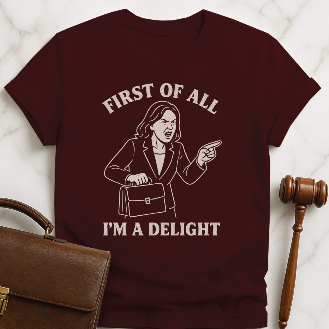 funny law school grad graphic tshirt that says first of all im a delight featuring a woman in a suit screaming in brown