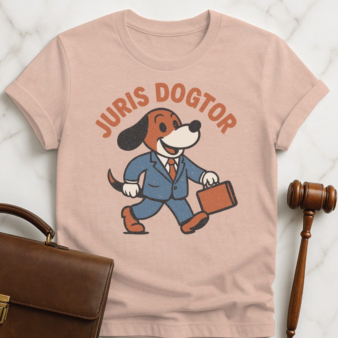 cute new lawyer graphic t shirt that says juris dogtor featuring a cute vintage dog in a suit and carrying a briefcase in heather peach