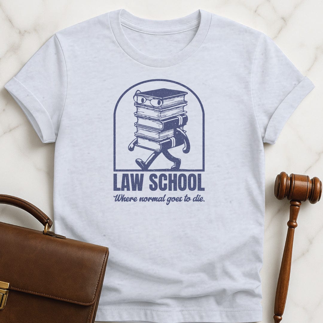 funny law graduate tshirt that says Law School Where Normal Goes to Die featuring pile of books with a face in grey