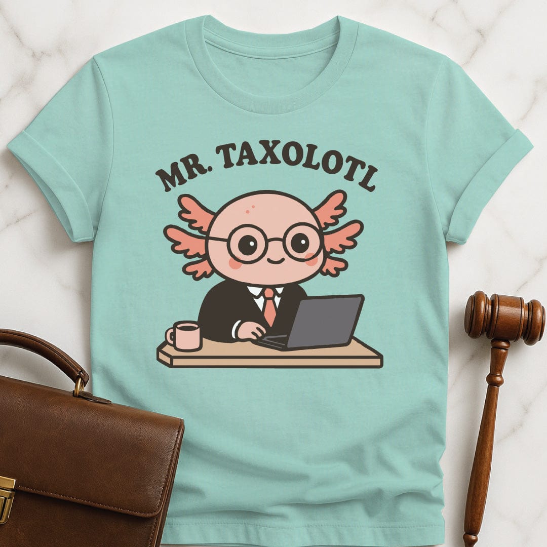 cool law grad tee featuring axolotol in a business suit at a desk with a laptop and a mug in heather green