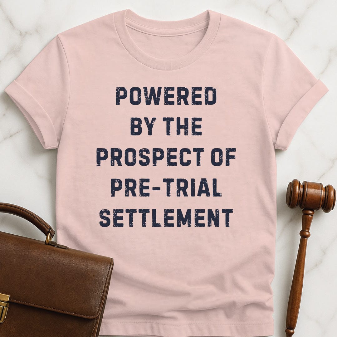 funny attorney t-shirt that says powered by the prospect of pre-trial settlement in pink