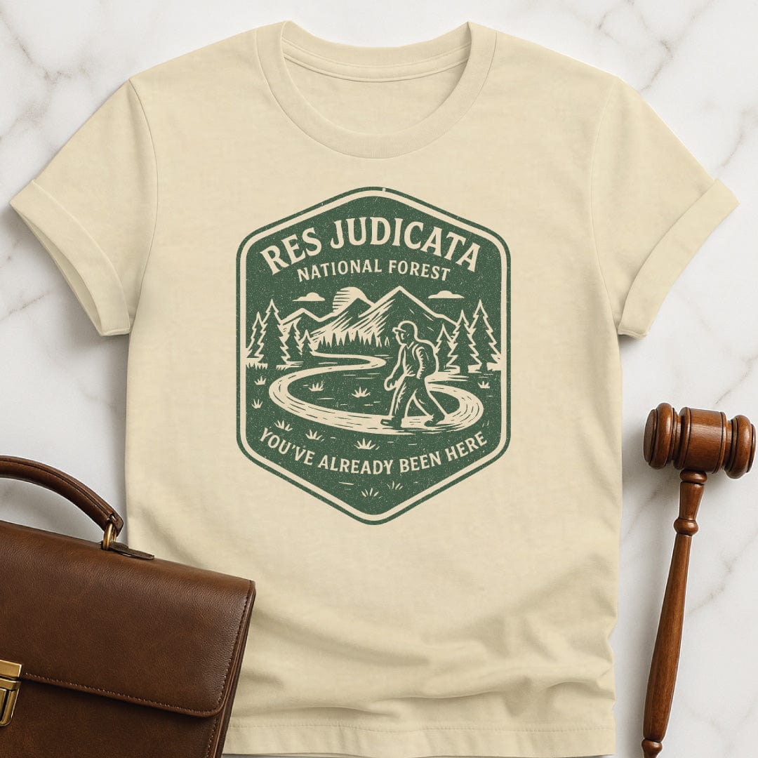 funny lawyer graphic t shirt that says res judicata national park youve already been here featuring a circular path in a forest in cream