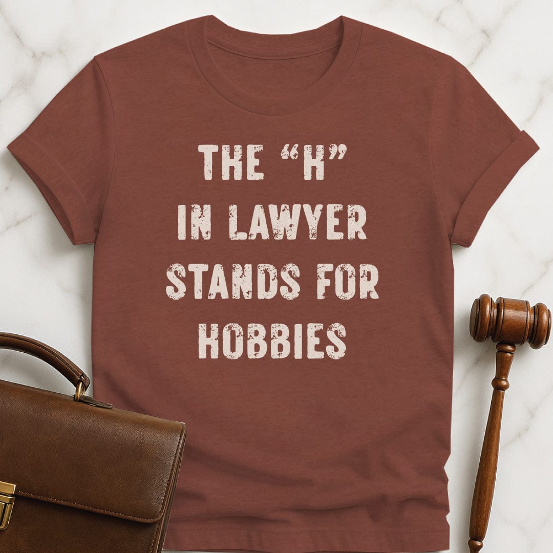 clever new lawyer graphic t shirt that says The H in Lawyer Stands for Hobbies in heather brown