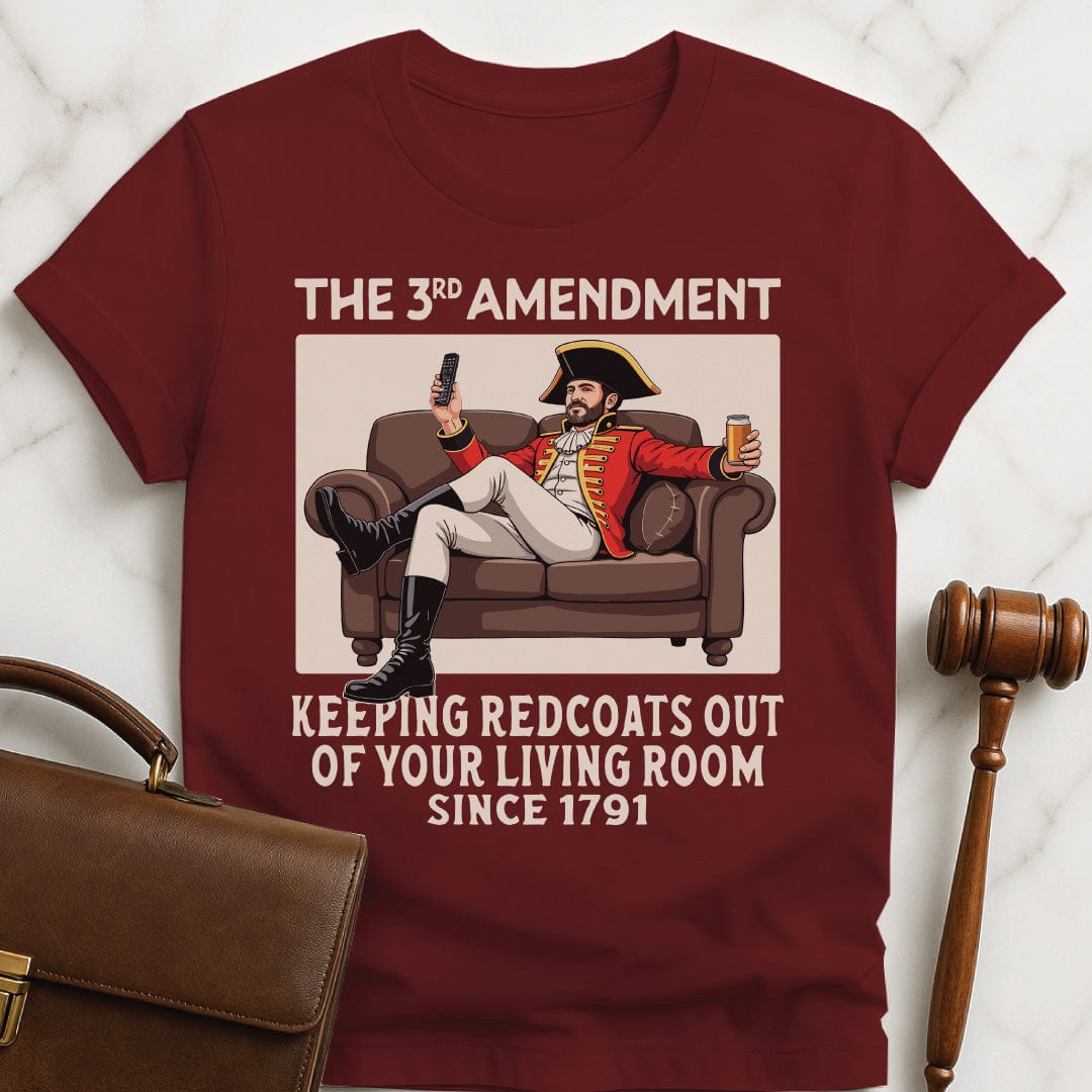 cool law grad tee that says third amendment keeping redcoats out of your featuring a man in british revolutionary uniform sitting on couch drinking a beer and holding a remote control in red