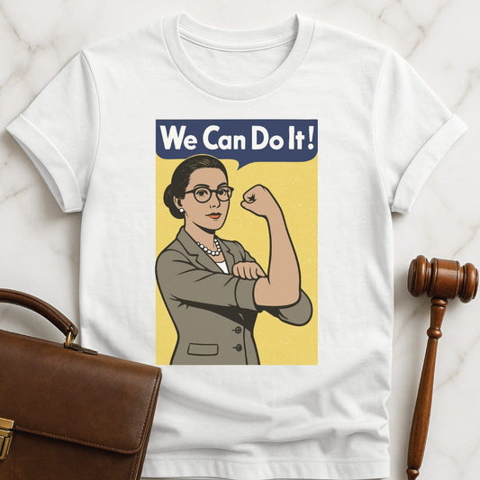 feminist lawyer graphic t shirt that says we can do it featuring a white woman in a business suit posing like Rosie the Riveter in white