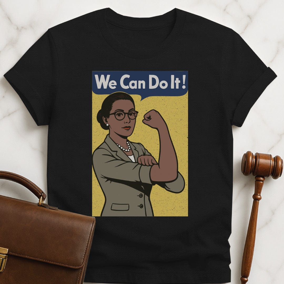 feminist law grad graphic tee that says We can do it featuring a woman in a suit posing like Rosie the Riveter with a yellow background in black