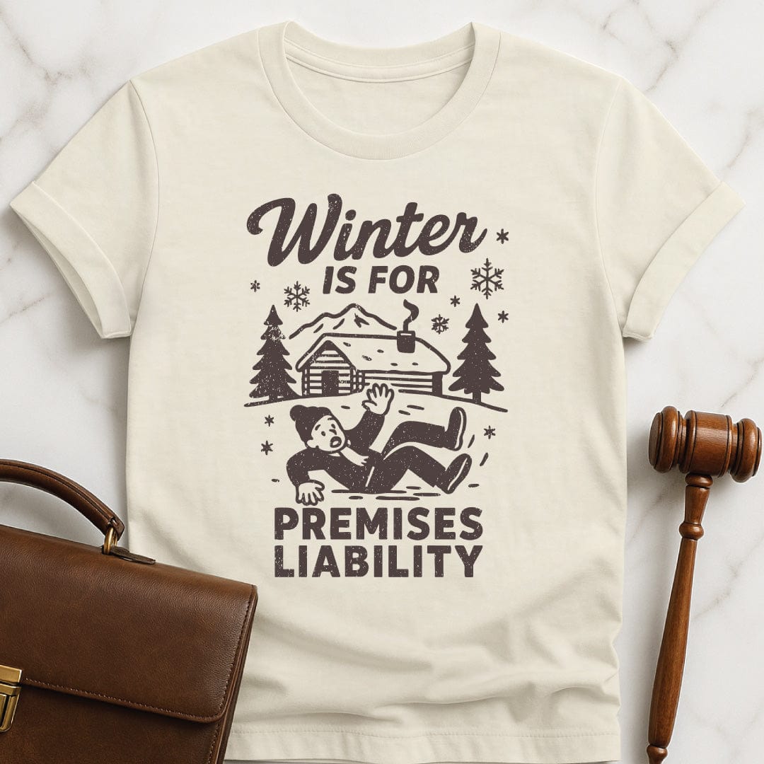 cool new lawyer t shirt that says Winter is for premises liability featuring man falling on snow in cream