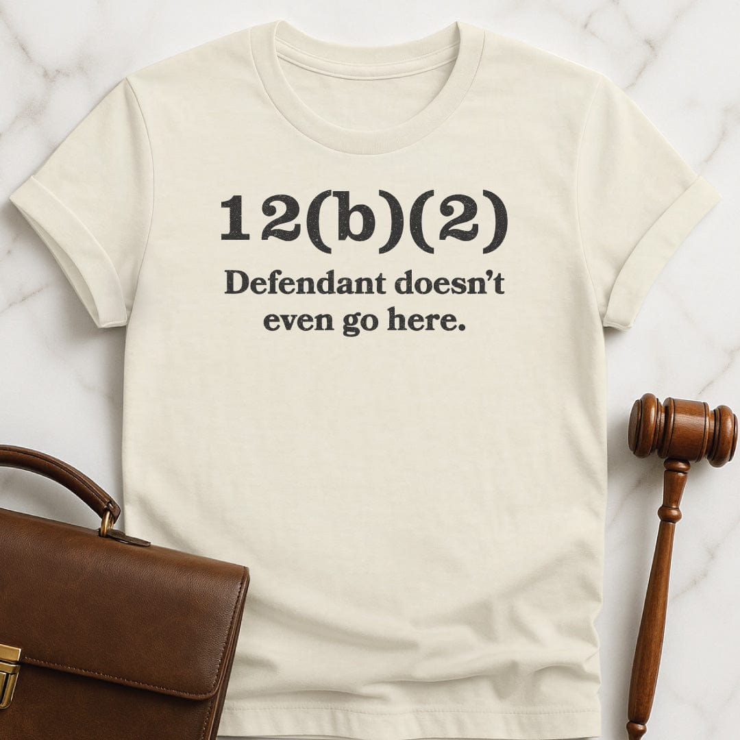 funny law school grad graphic t-shirt that says 12b2 defendant doesnt even go here in cream