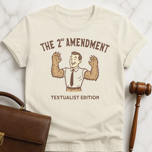 funny law student t-shirt that says The second amendment textualist edition featuring a man with bears arms in cream