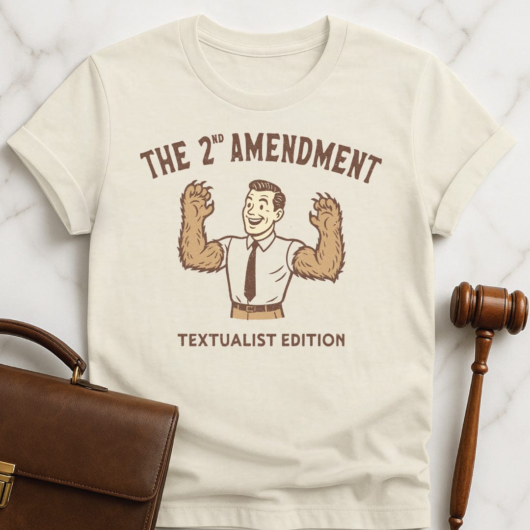 cute law grad graphic t shirt that says The second amendment textualist edition featuring a man with bears arms in cream
