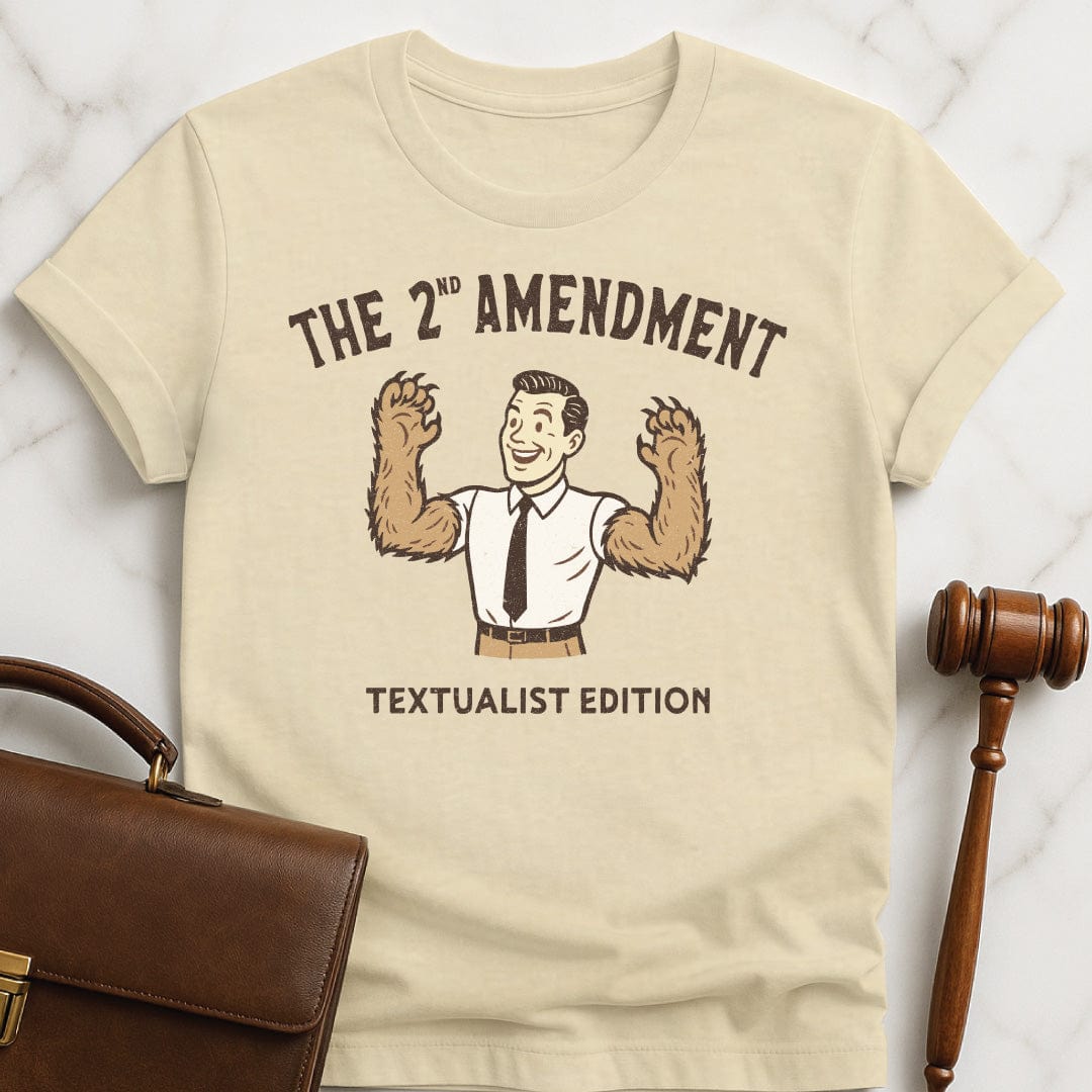 cute lawyer tee that says The second amendment textualist edition featuring a man with bears arms in cream