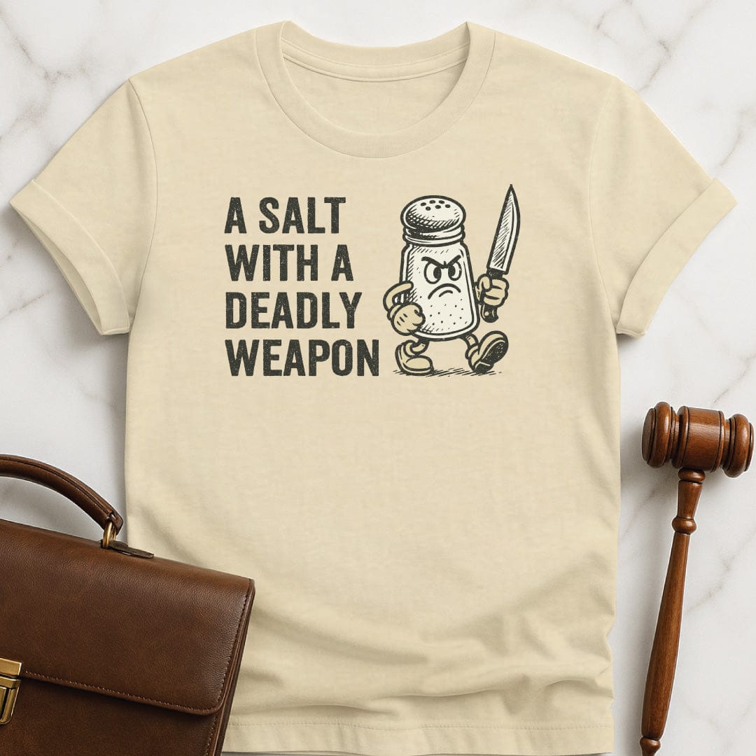 funny law school grad t-shirt that says A Salt with a Deadly Weapon featuring salt shaker with a knife in cream