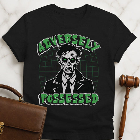 cool attorney t-shirt that says adversely possessed featuring a zombie in black