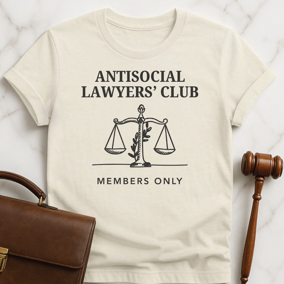 cute attorney graphic t-shirt that says Antisocial lawyers club members only featuring scales of justice in cream