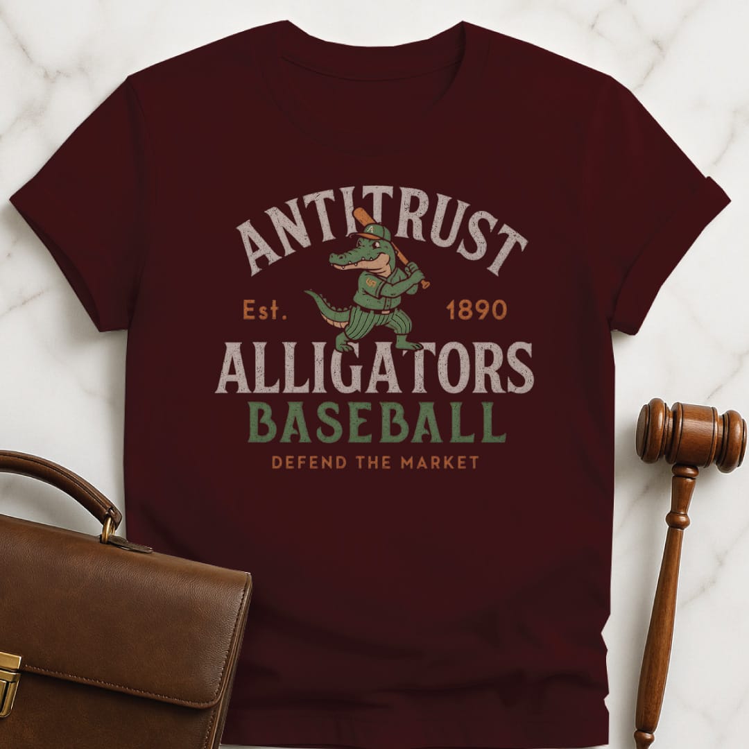 funny attorney graphic t-shirt that says antitrust alligators baseball defend the market est 1890 featuring alligator in a baseball uniform holding a bat in brown