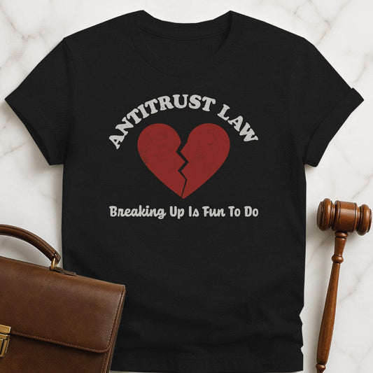 funny new attorney graphic t-shirt that says Antitust law breaking up is fun to do featuring broken heart in black