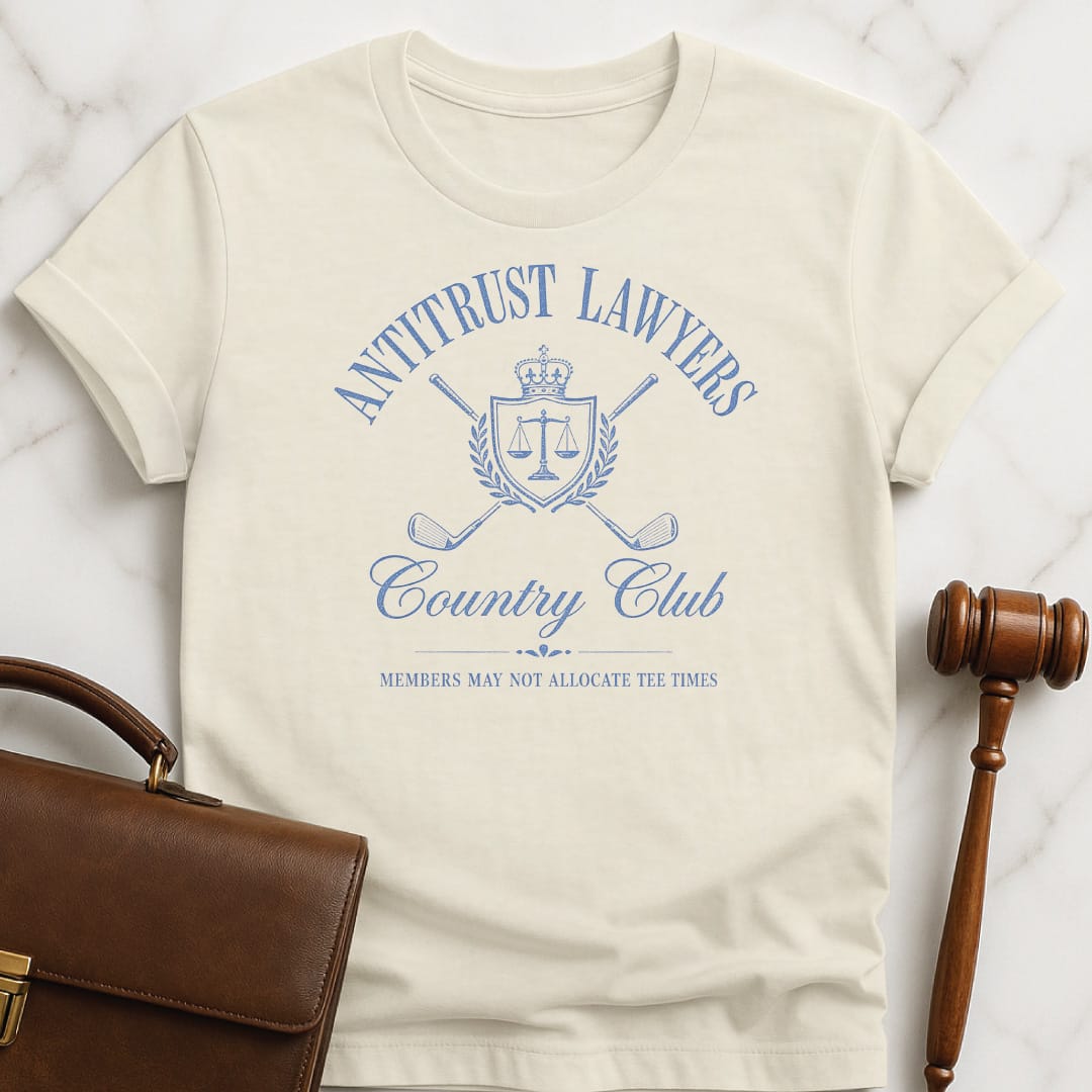 funny law school graphic t-shirt that says Antitrust lawyers country club members may not allocate tee times featuring golf clubs in a crest in cream