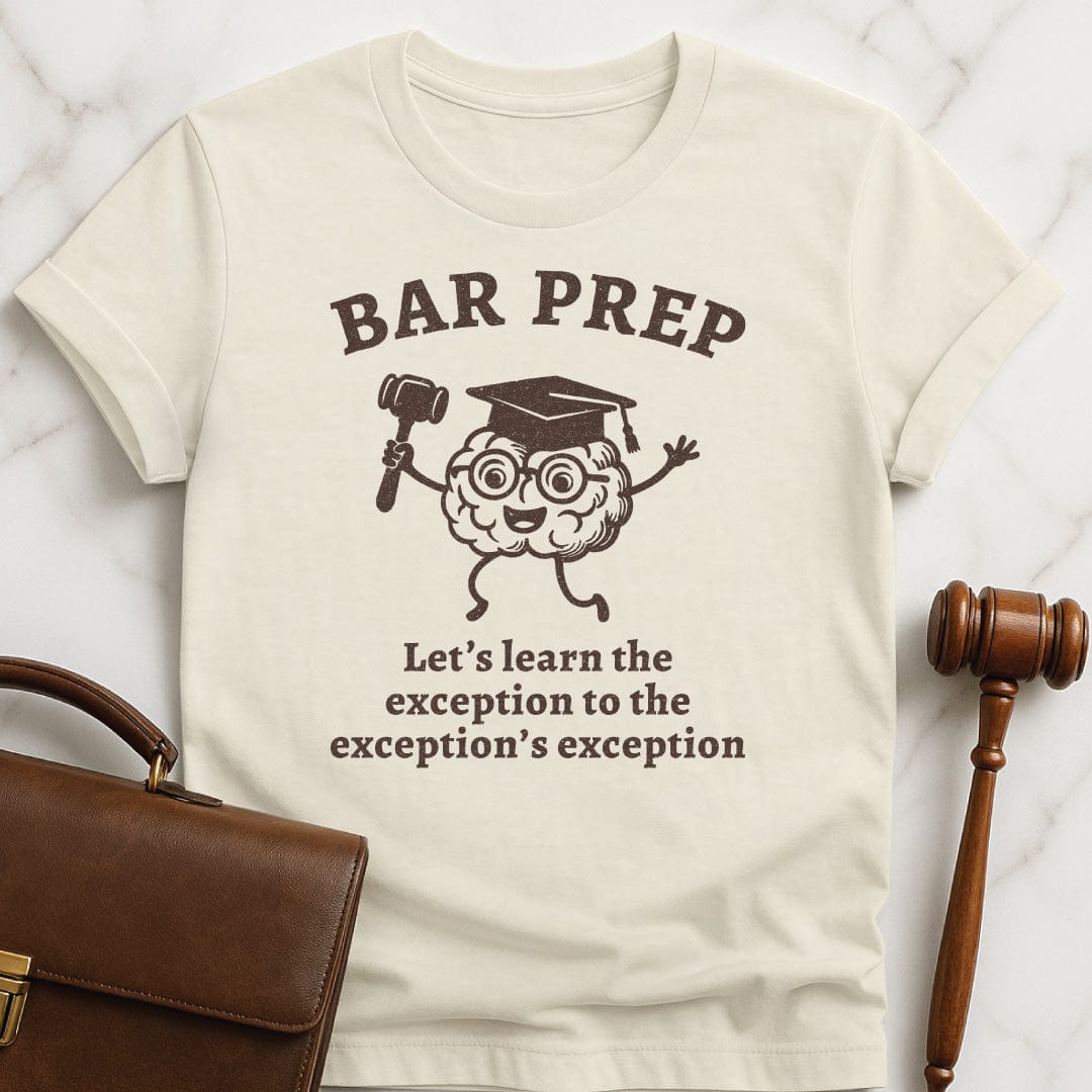 ironic law school graduate graphic t shirt that says Bar Exam Lets Learn the Exception to the Exceptions Exception featuring brain with a graduation hat and a gavel in cream