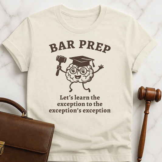 ironic law school graduate graphic t shirt that says Bar Exam Lets Learn the Exception to the Exceptions Exception featuring brain with a graduation hat and a gavel in cream