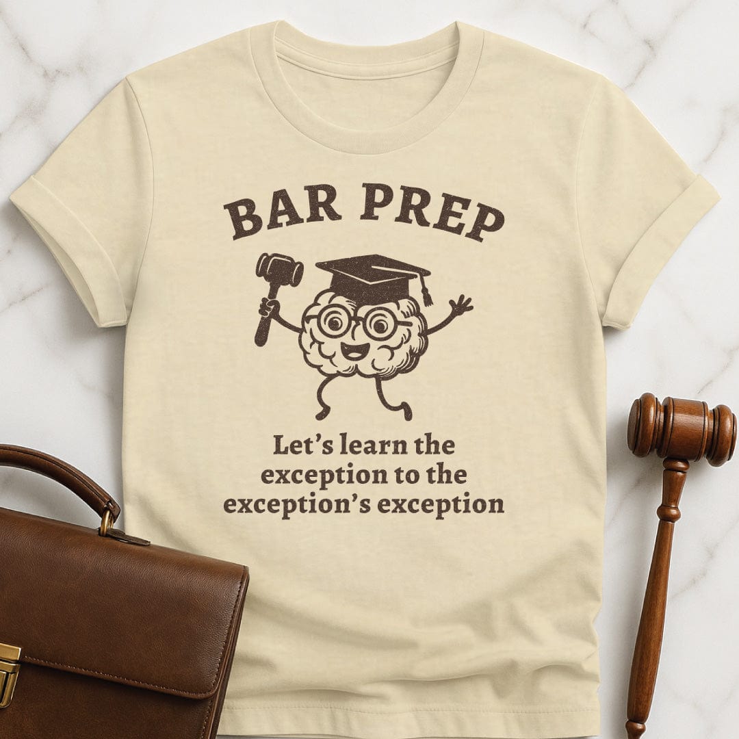 ironic law school tee that says Bar Exam Lets Learn the Exception to the Exceptions Exception featuring brain with a graduation hat and a gavel in cream