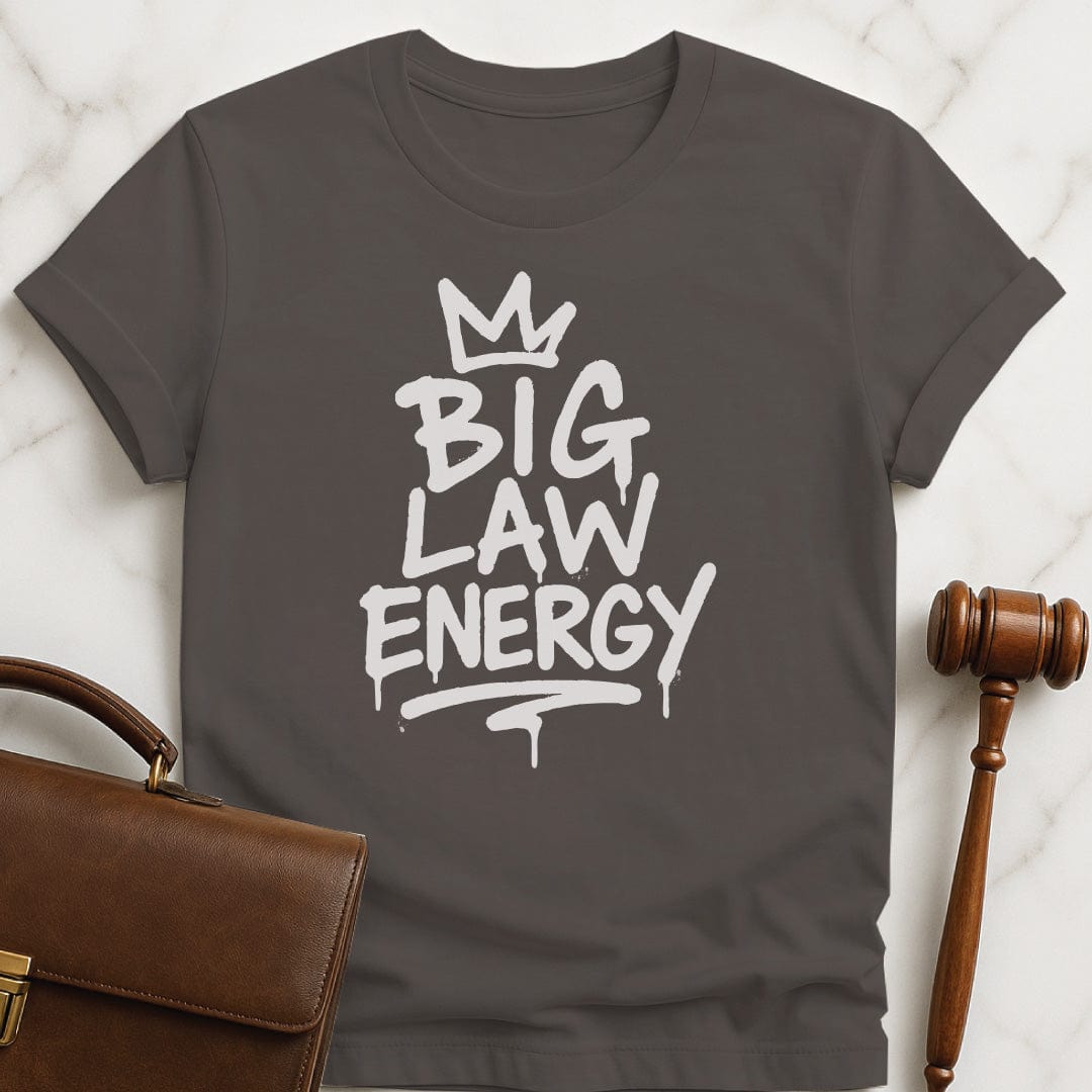 cool law grad graphic tee that says Big Law Energy featuring graffiti font with a crown on top in grey