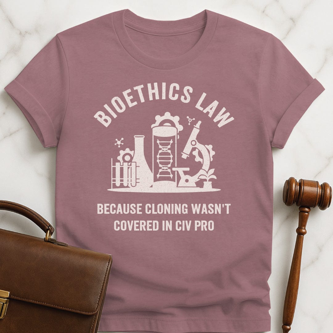 funny law school grad graphic tshirt that says Bioethics law because cloning wasnt covered in civ pro featuring a science lab in heather mauve