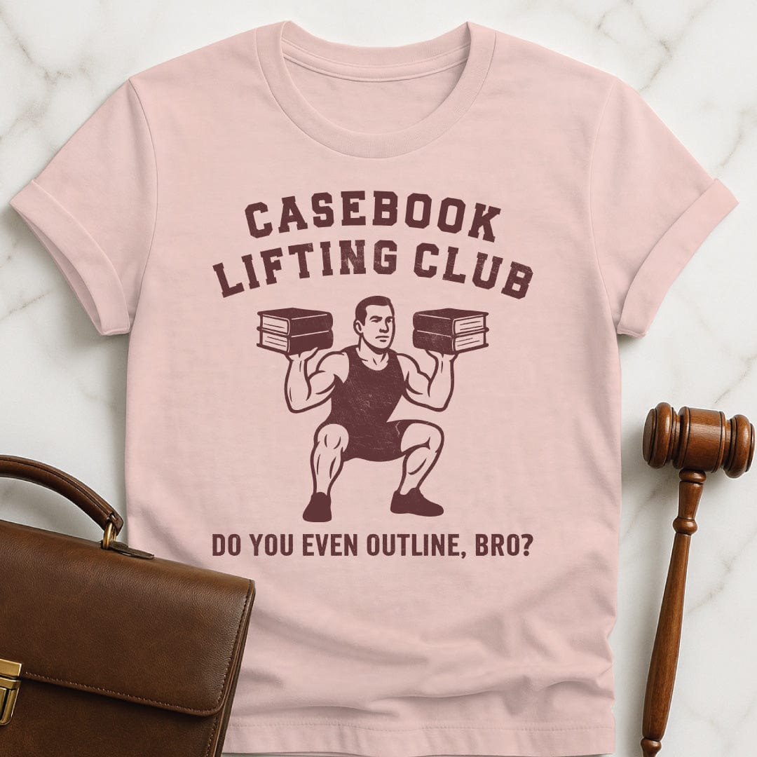 funny law student t-shirt that says Casebook Lifting Club Do you even outline bro featuring bodybuilder lifting casebooks in pink