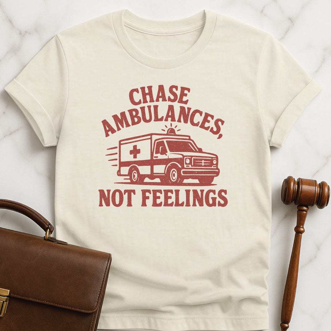 funny attorney graphic tshirt that says Chase ambulances not feelings featuring red ambulance in cream