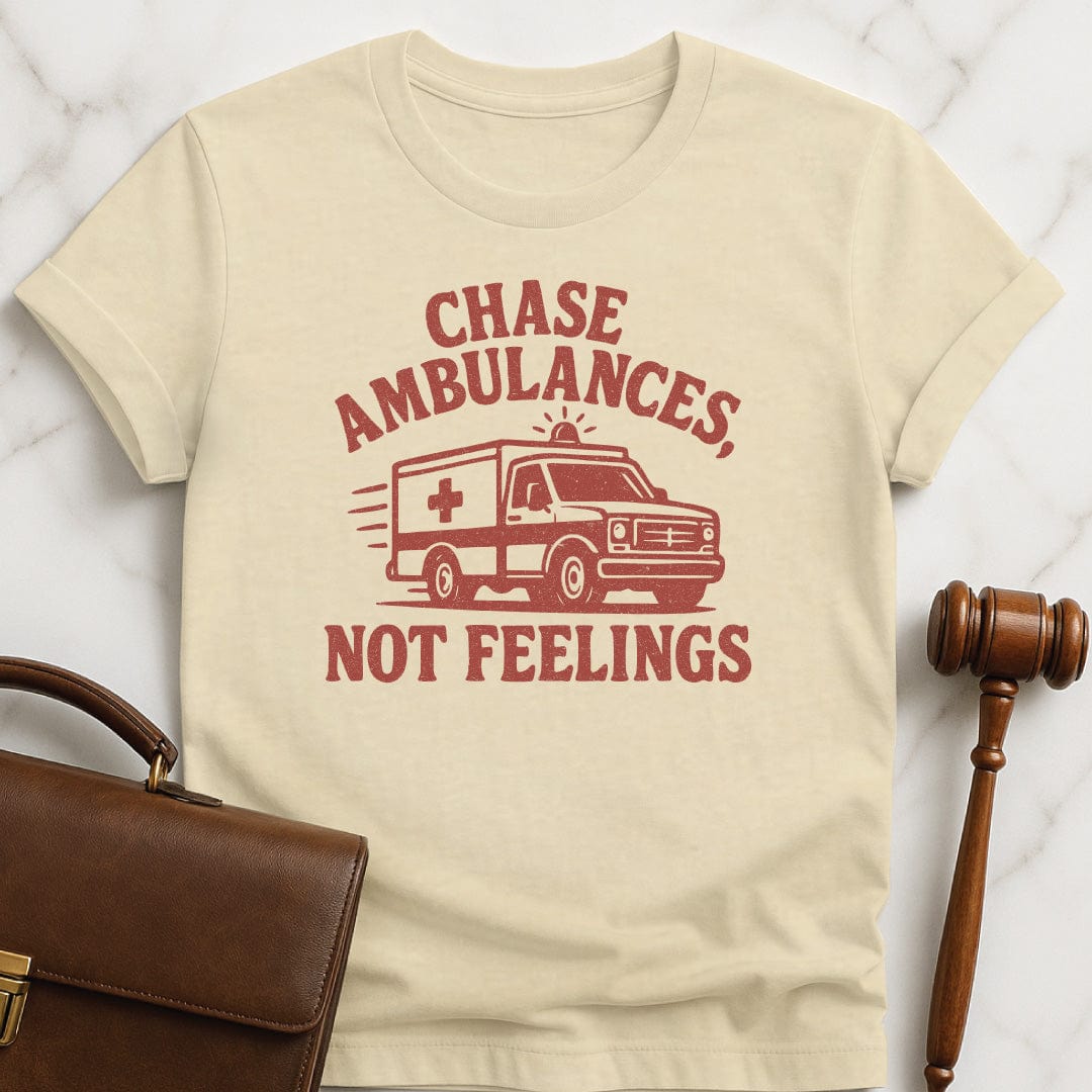 funny law graduate graphic t-shirt that says Chase ambulances not feelings featuring red ambulance in cream