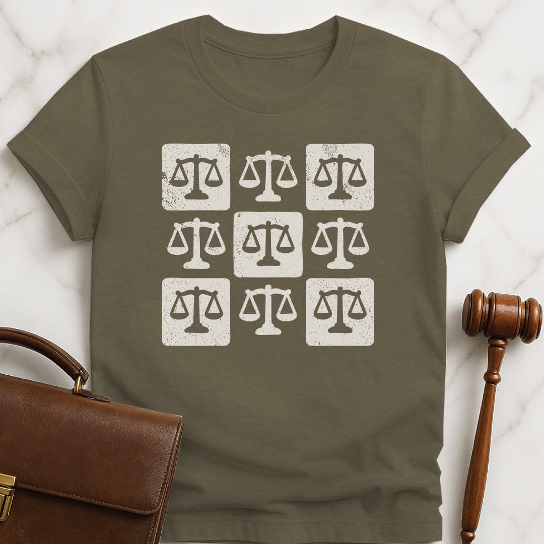 trendy new lawyer t shirt featuring checkered scales of justice in heather green