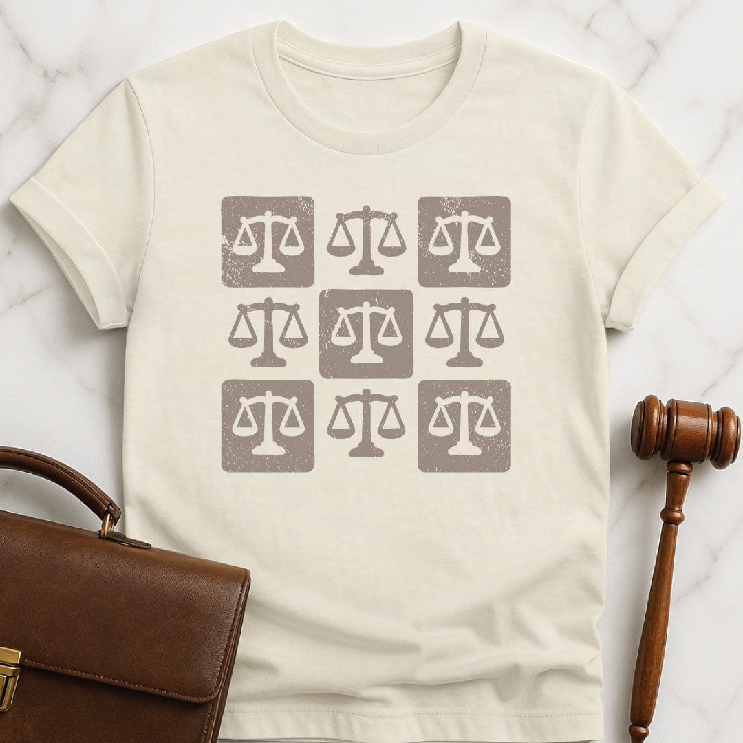 trendy new lawyer tee featuring checkered scales of justice in cream