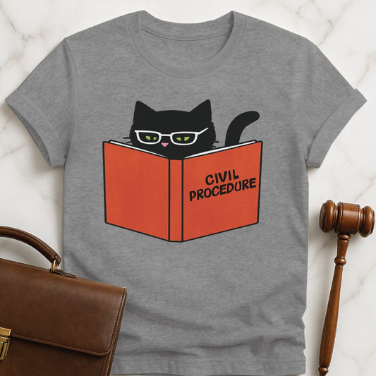 funny law student graphic t-shirt that says civ pro cat featuring a black cat reading a civil procedure case book in grey