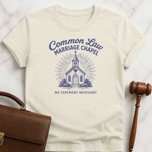 funny law school grad graphic t-shirt that says common law marriage chapel no ceremony necessary featuring wedding chapel in cream