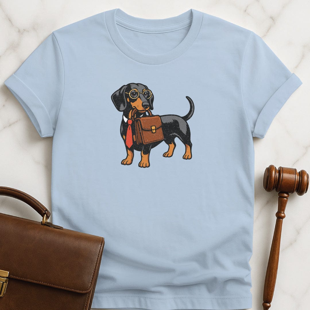 cute law student graphic t-shirt featuring dachshund dog lawyer carrying a briefcase and wearing a tie in blue