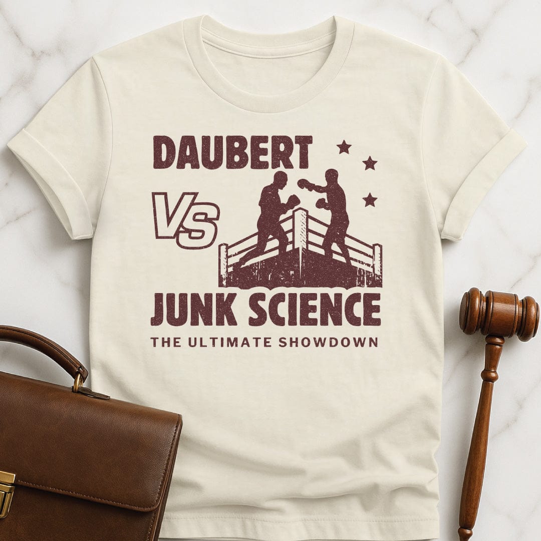 funny new attorney graphic t-shirt that says Daubert v Junk Science the Ultimate Showdown featuring boxing ring in cream