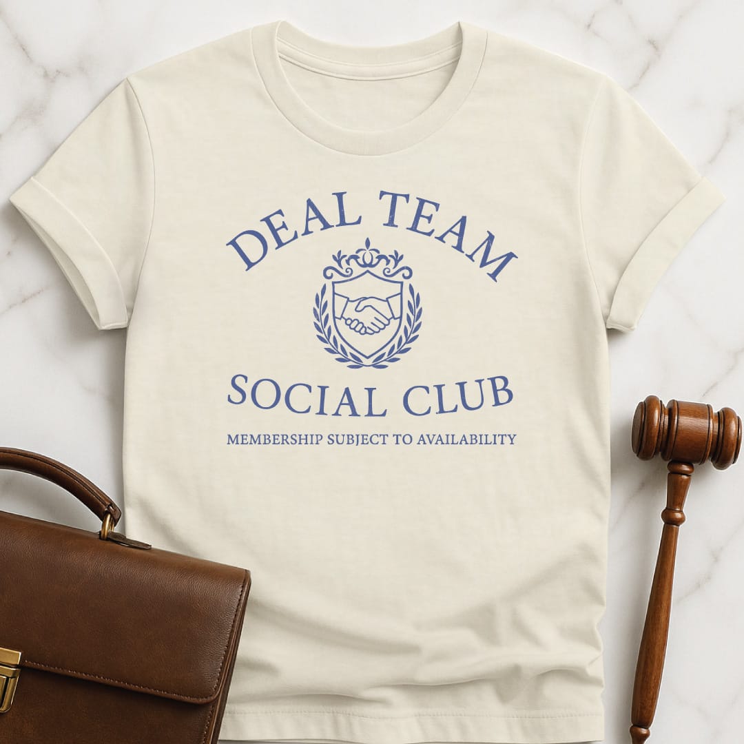 funny attorney graphic tshirt that says deal teamsocial club membership subject to availability featuring crest with a handshake in cream