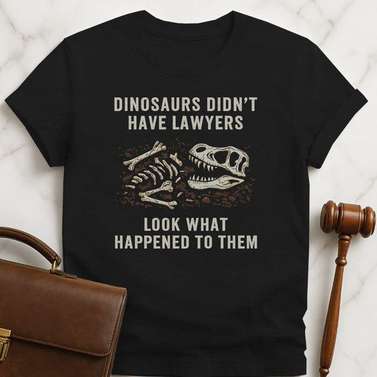 funny law graduate graphic t-shirt that says Dinosaurs Didnt Have Lawyers Look What Happened to Them featuring Dinosaur fossils in dirt in black
