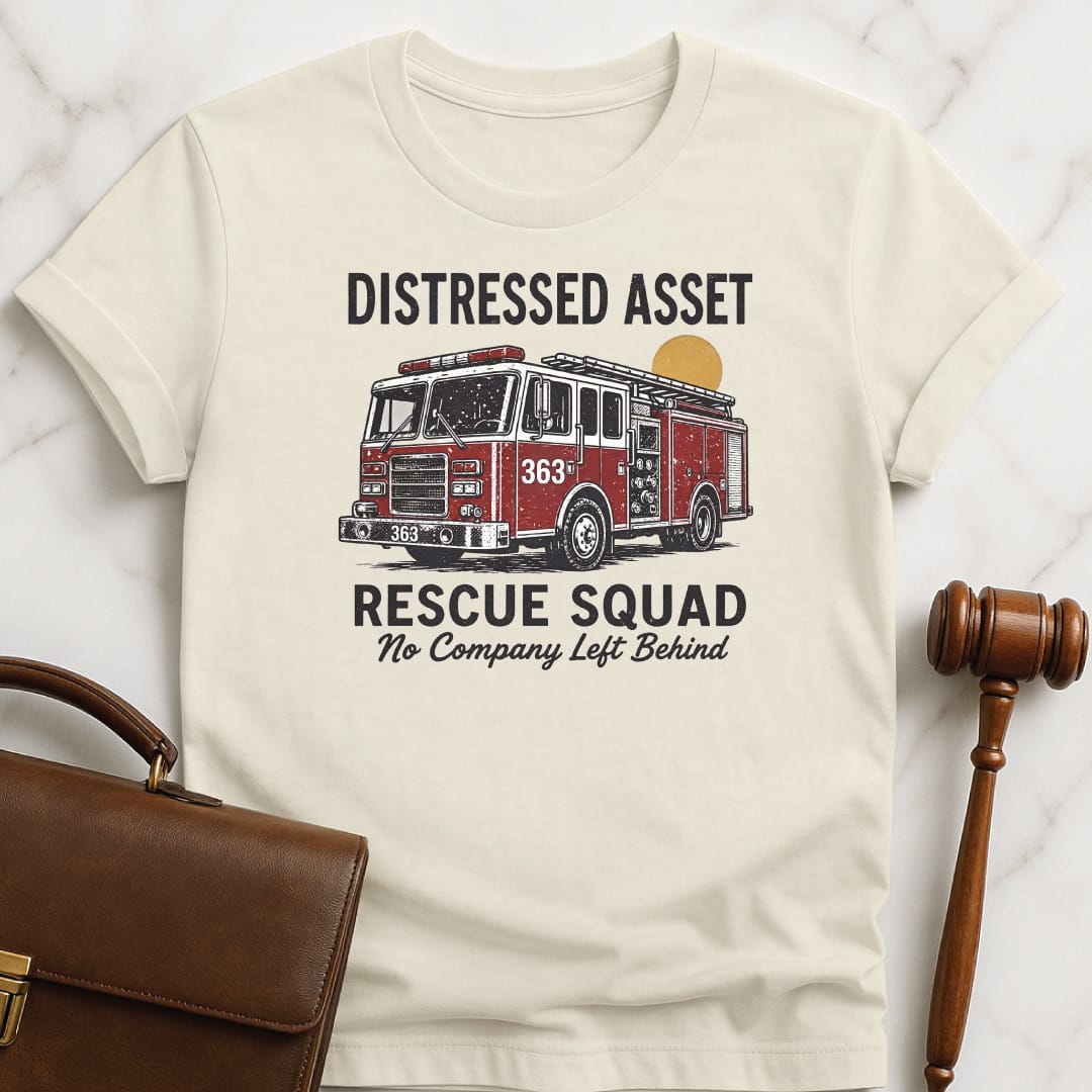 funny attorney graphic t-shirt that says distressed asset rescue squad 363 no company left behind featuring firetruck in cream