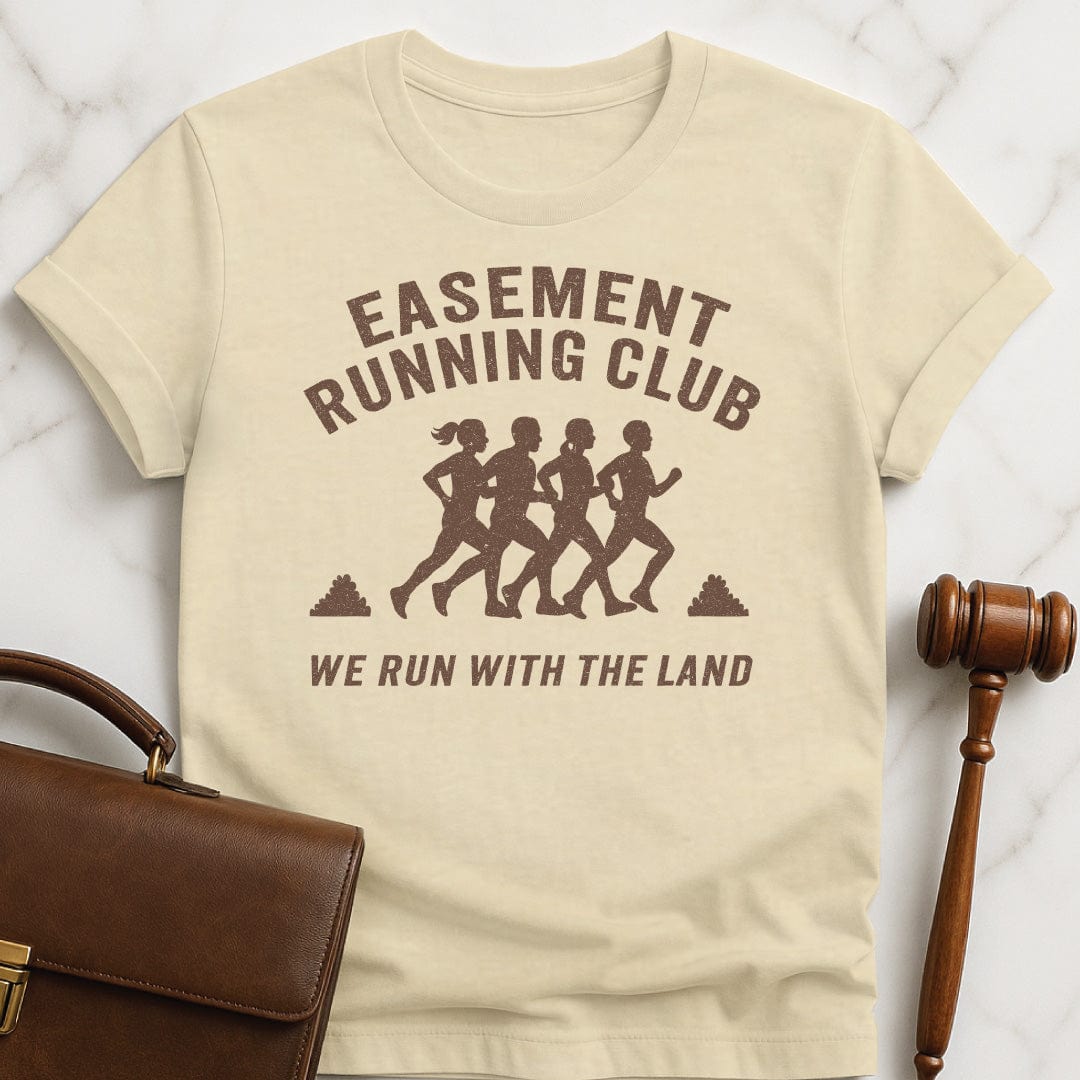 funny new attorney graphic tshirt that says easement running club run with the land featuring people running in cream