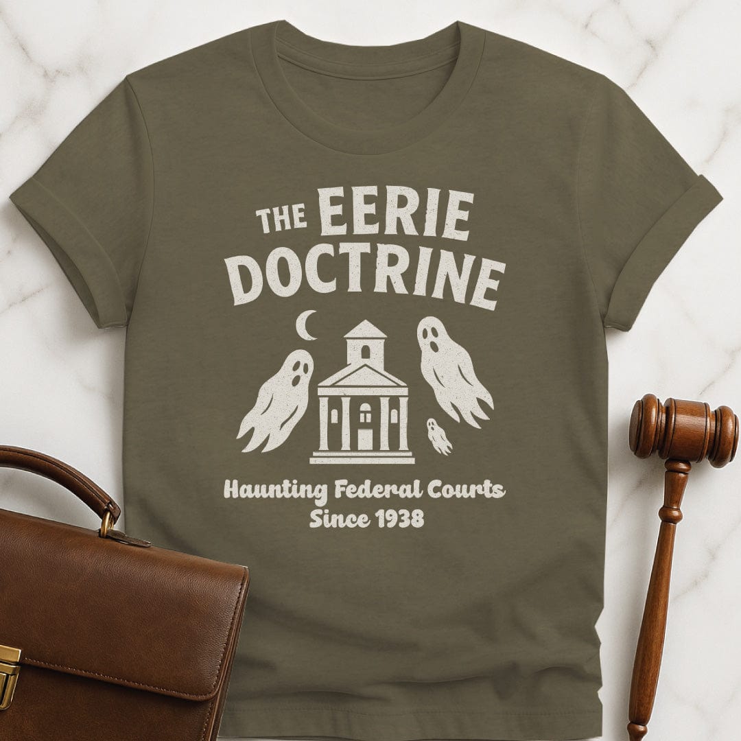 funny law graduate graphic tshirt that says Eerie doctrine haunting federal courts since 1938 featuring ghosts and a courthouse in heather green