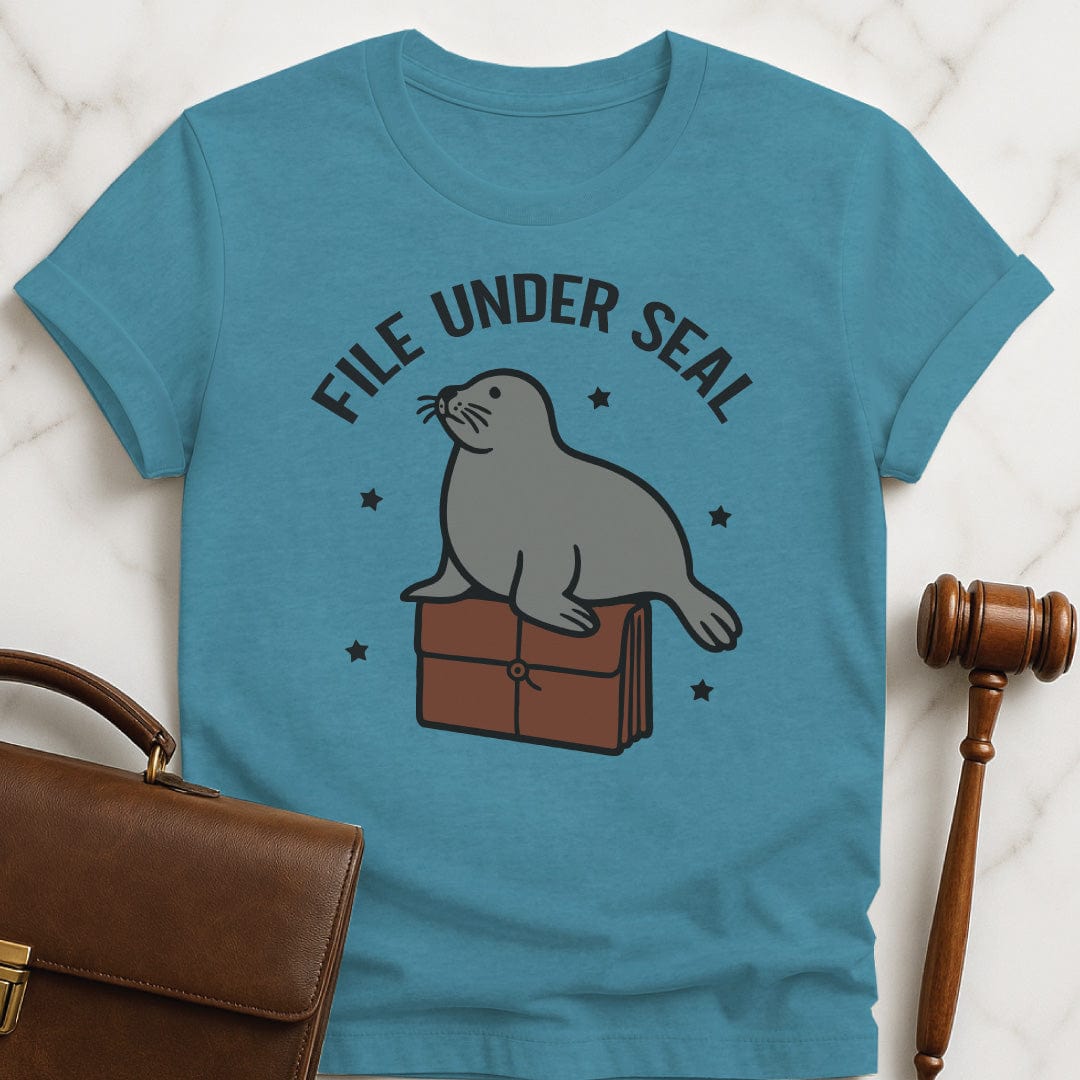 funny lawyer graphic tee that says file under seal featuring a seal sitting on top of a redwell in heather aqua