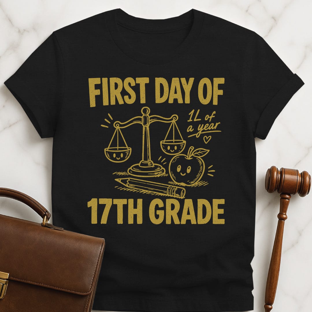 cool law student tee that says First Day of 17th Grade 1L of a year featuring apple scales of justice pencil and a heart in black